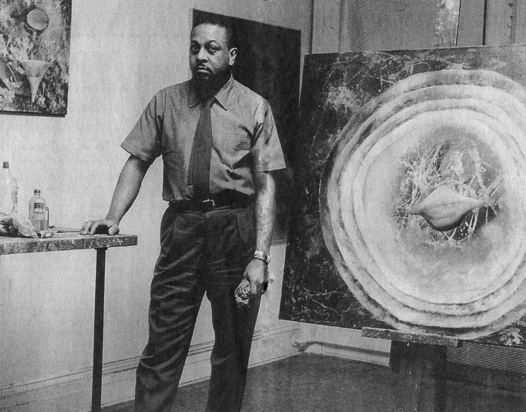 Thomas Sills with paintings in his West 11th St. studio, 1956